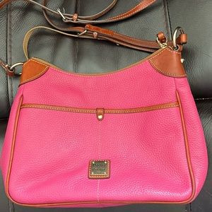 Beautiful pink Dooney & Burke crossbody bag.